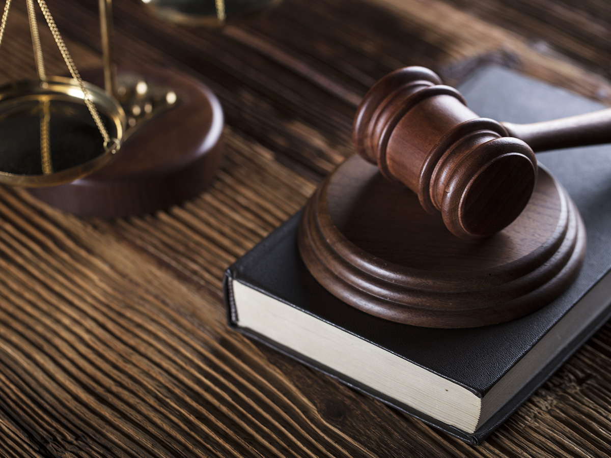 gavel, law book, and scale