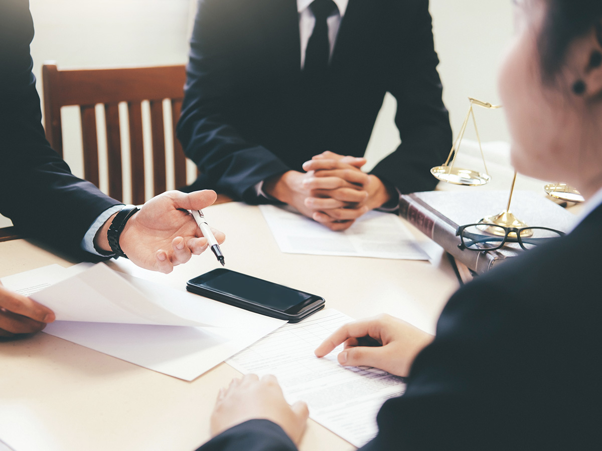 Laywers discussing with client