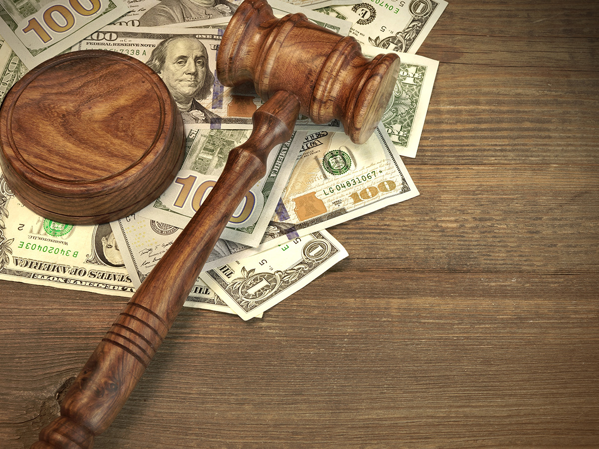 gavel and dollar bills